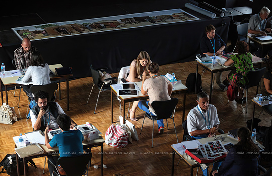 Manik Katyal doing portfolio reviews at Encontres da Imagem, Braga, Portugal.