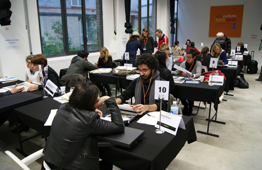 Manik Katyal doing portfolio reviews at Lens Culture Foto Fest in Paris, France.